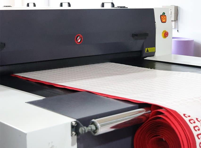 Applying industrial heat-seal backing